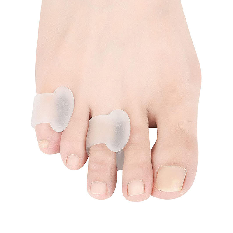 Separador de dedos meñique de gel translúcido para dedos superpuestos y rizados